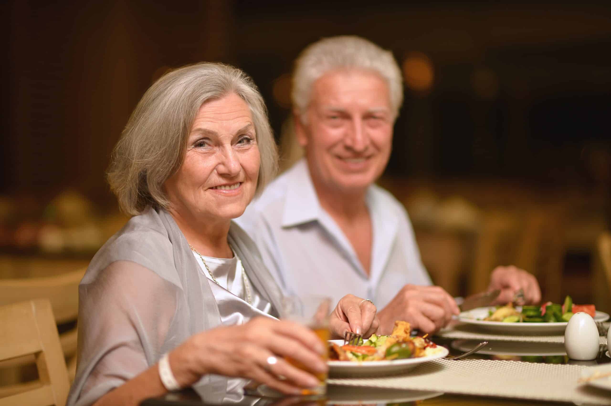 Senior couple dining at restaurant