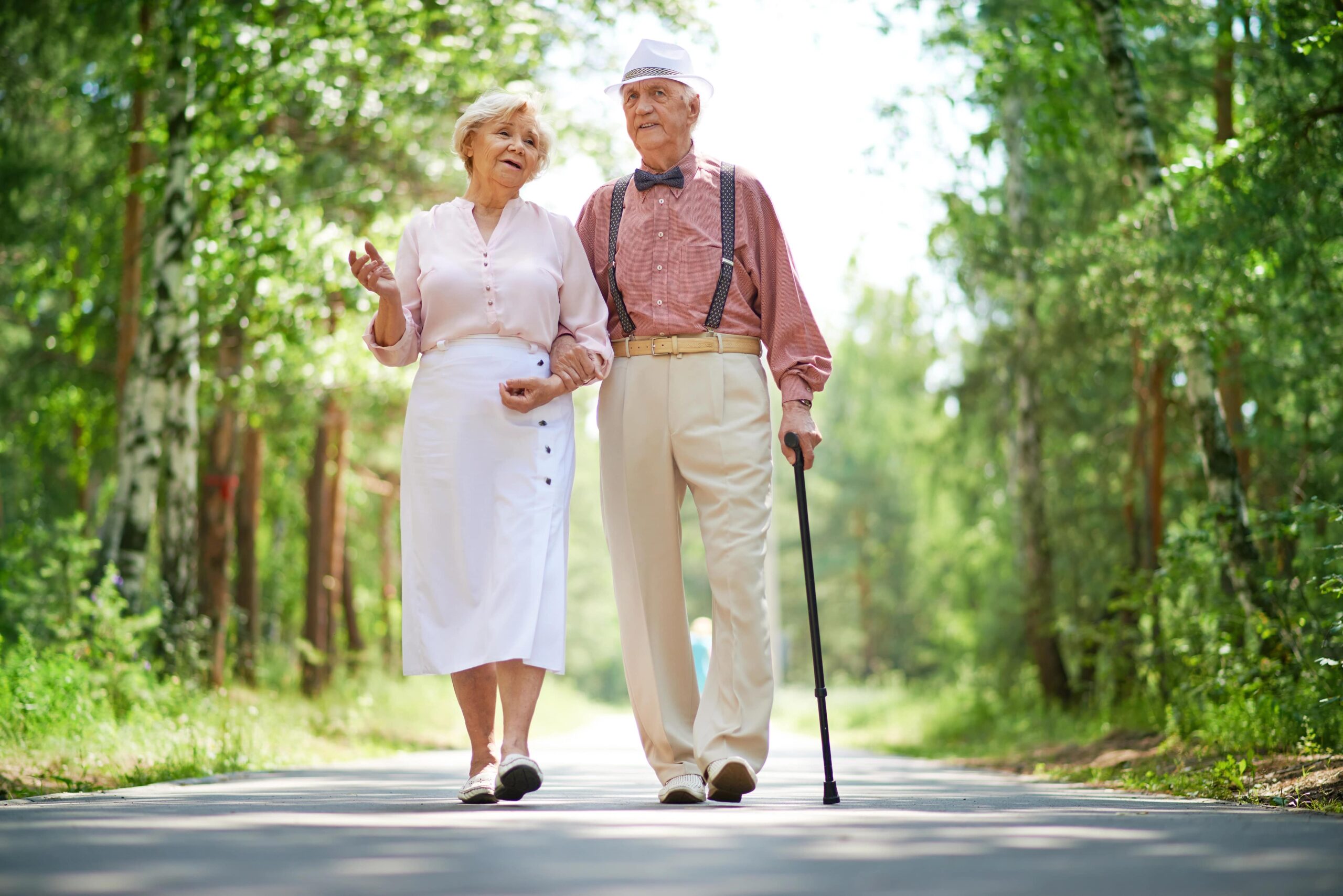 Senior couple strolling outside on a lovely spring day